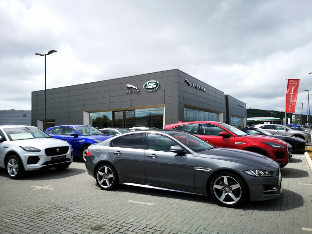 UK auto industry cuts 2022 outlook on supply snags, rising cost of living