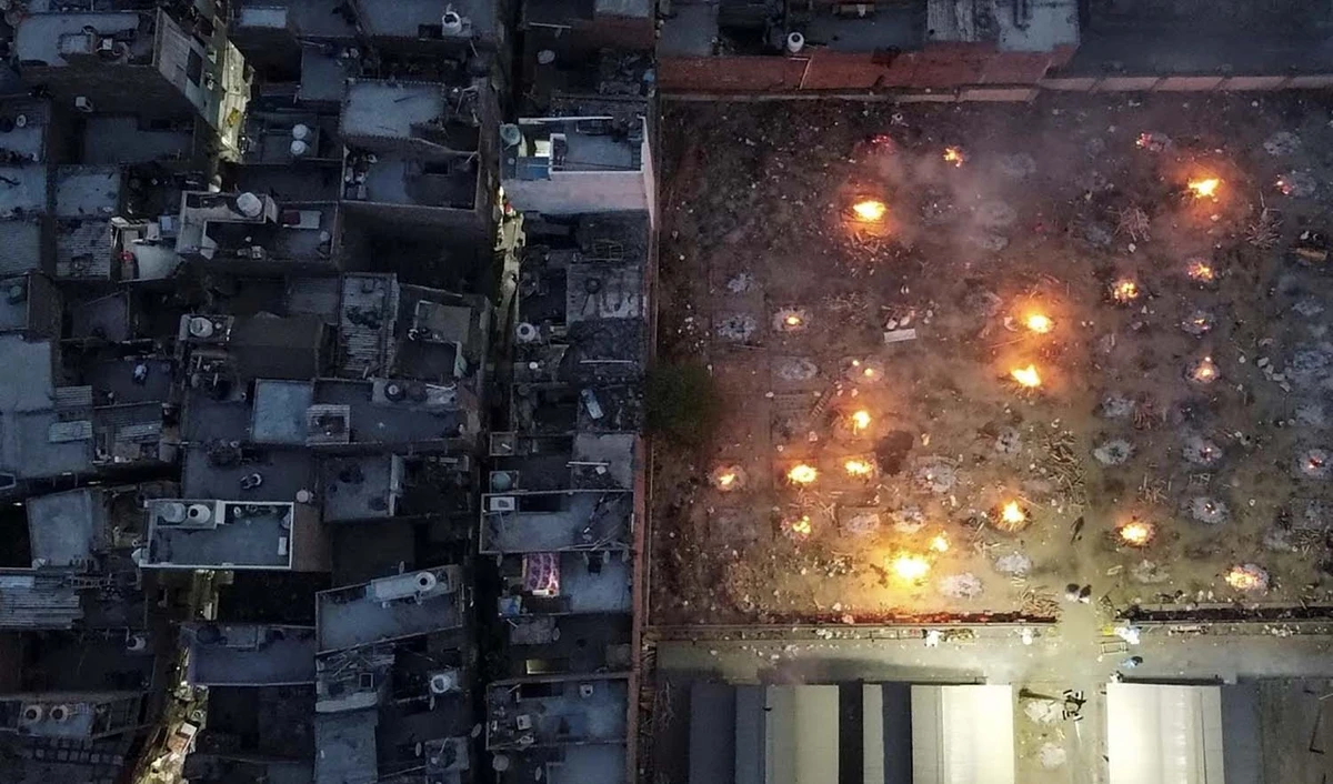 A mass cremation of victims who died due to the coronavirus disease (COVID-19), is seen at a crematorium ground in New Delhi, India, on April 22, 2021. (REUTERS/File)