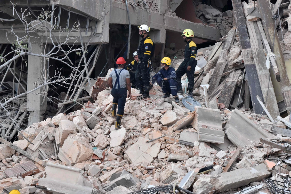 Rescuers look for victims at Cuba hotel after blast kills 22