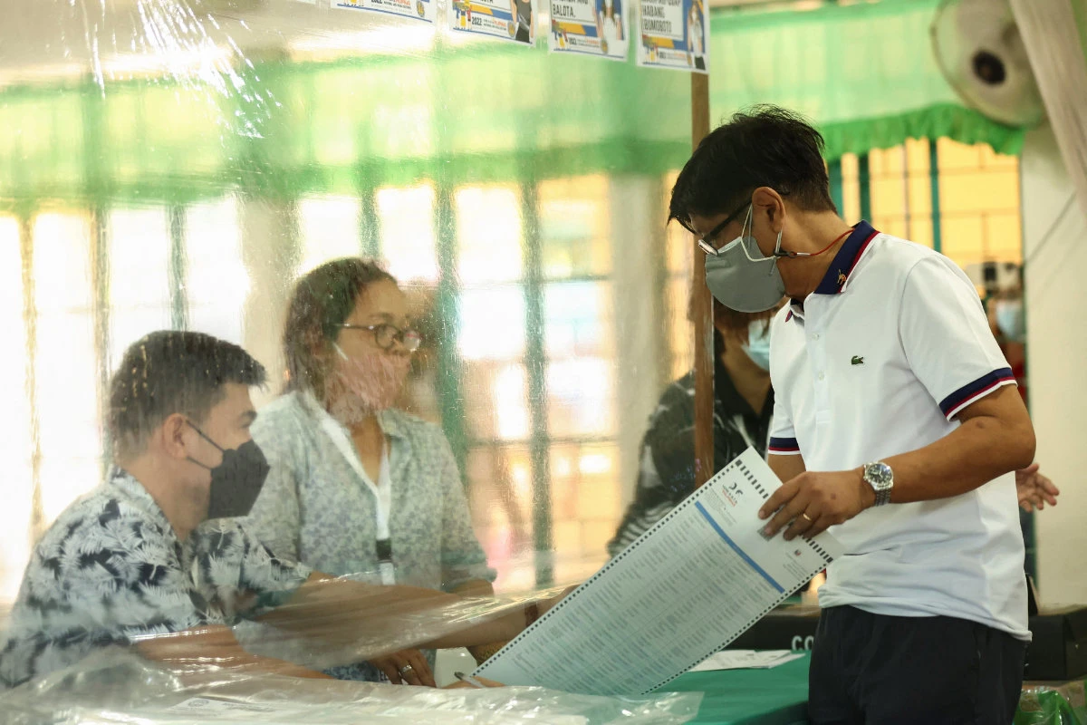 Presidential aspirant Ferdinand "Bongbong" Marcos Jr. casts his vote in the 2022 national elections at in Batac, Ilocos Norte, Philippines, on May 9, 2022. (REUTERS/Eloisa Lopez)