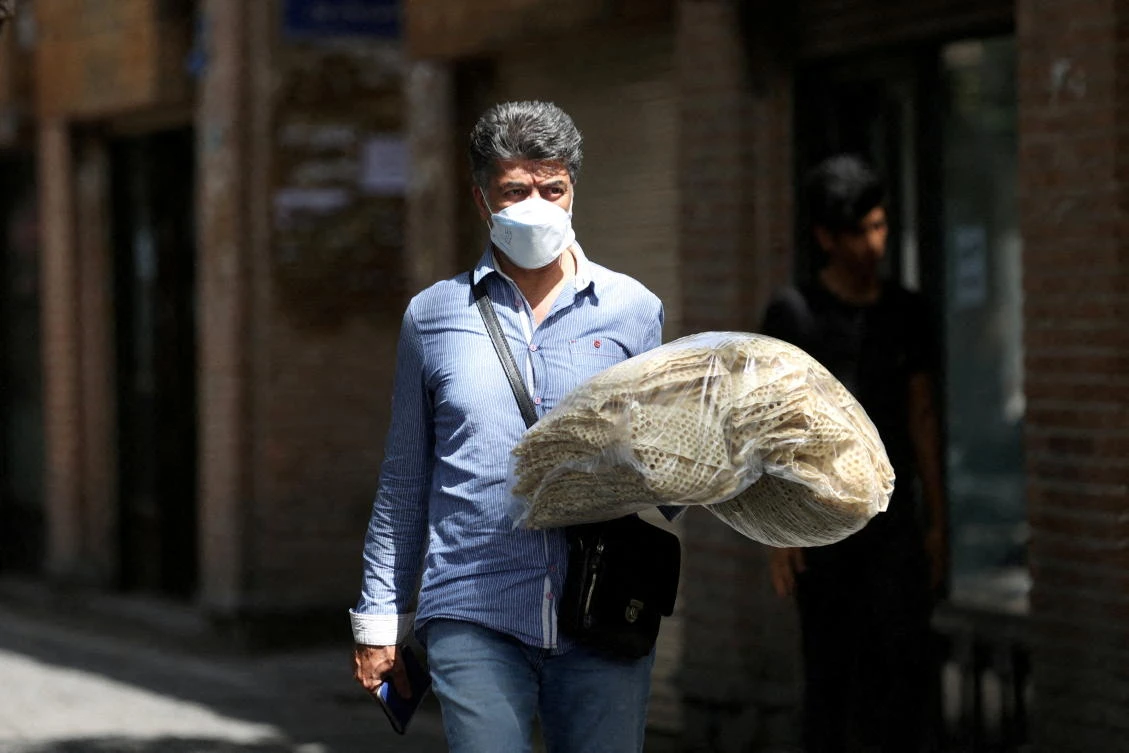 Price protests turn political in Iran as rallies spread