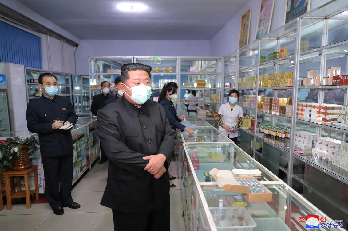 North Korean leader Kim Jong Un inspects a pharmacy in Pyongyang after he ordered the army’s medical corps to ‘stabilize the supply of medicines.’ (KCNA via Reuters)