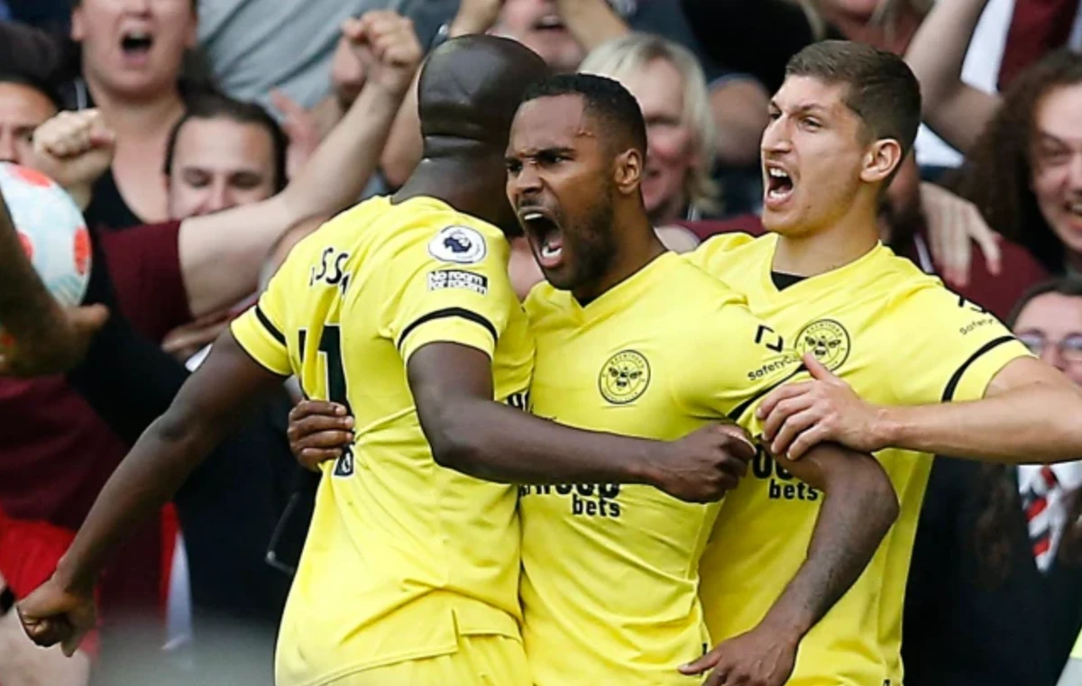 Rico Henry (C) of Brentford, who scored the winning goal in a 3-2 win at Everton, alleged his family members were abused by a supporter at Goodison Park. (Reuters)