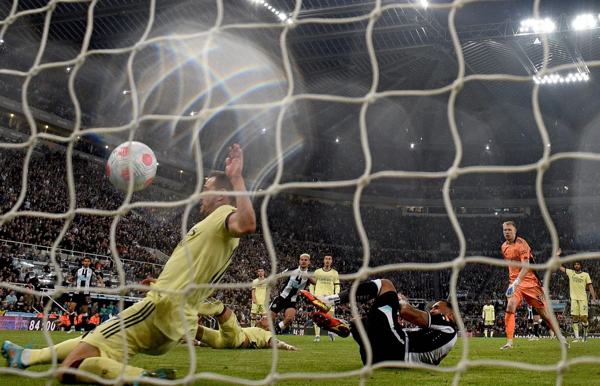 Newcastle United's midfielder Bruno Guimaraes (C) scores the team's second goal against Arsenal at St James' Park in Newcastle-upon-Tyne, England on May 16, 2022. (AFP)