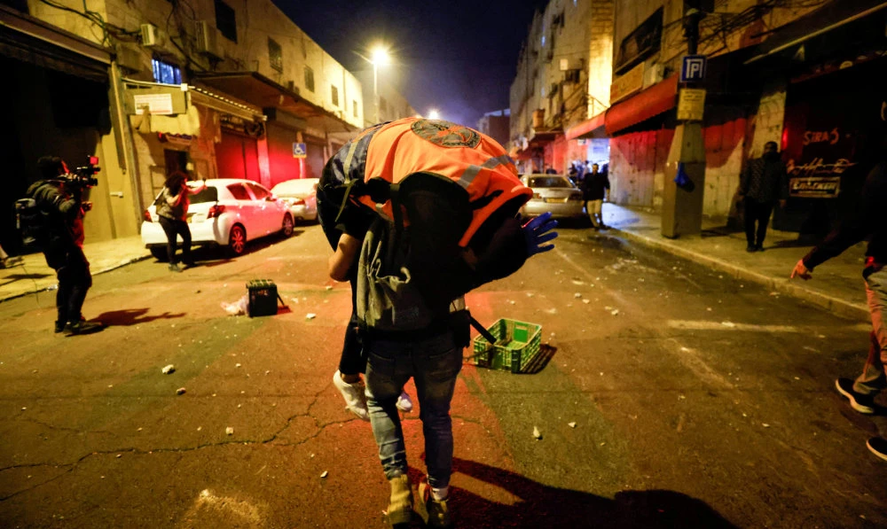 Scores injured as Israeli forces attack Palestinian funeral in Jerusalem