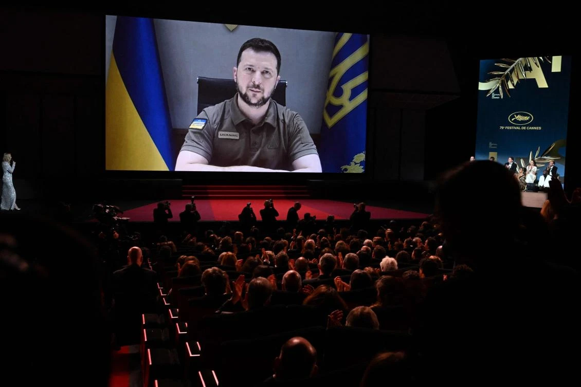 Ukrainian President Volodymyr Zelensky addresses guests during the Opening Ceremony of the 75th edition of the Cannes Film Festival in Cannes, southern France, May 17, 2022. (AFP)