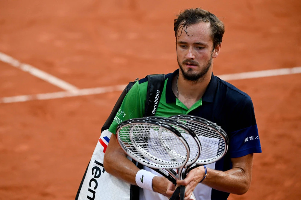 Russia's Daniil Medvedev leaves the court after being defeated by France's Richard Gasquet at the ATP 250 Geneva Open tennis tournament in Geneva on May 17, 2022. (AFP)