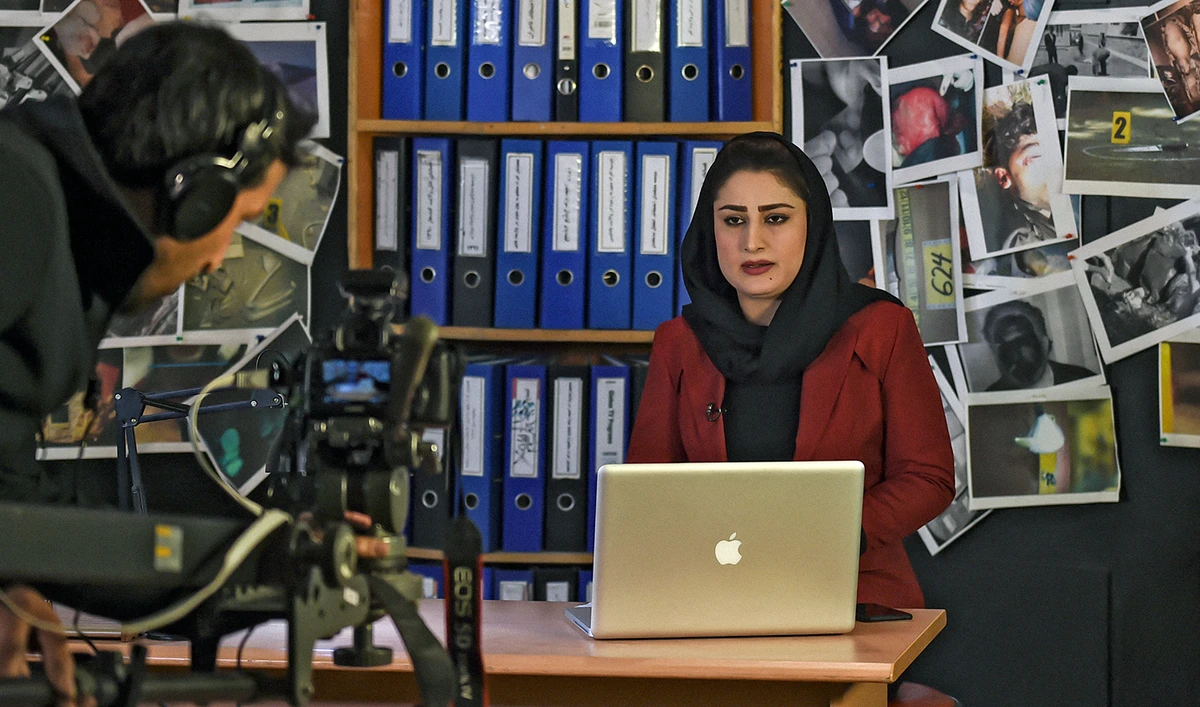 Afghan anchorwoman Shukria Niazai presents "Adalat" show in a TV studio in Kabul on March 15, 2020. (AFP/File)