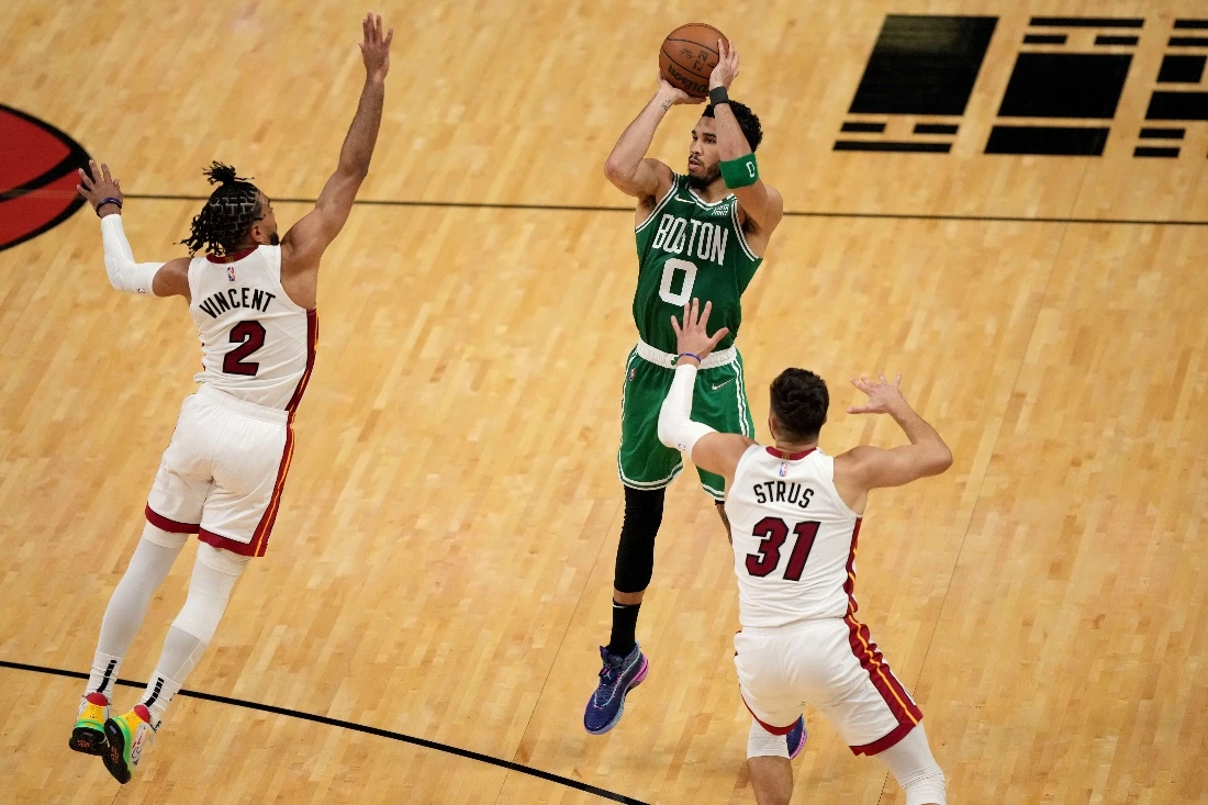 Jayson Tatum of the Boston Celtics shoots the ball against Gabe Vincent of the Miami Heat during the second quarter in Game 1 of the 2022 NBA Playoffs Eastern Conference finals at FTX Arena on May 17, 2022 in Miami, Florida. (AFP)