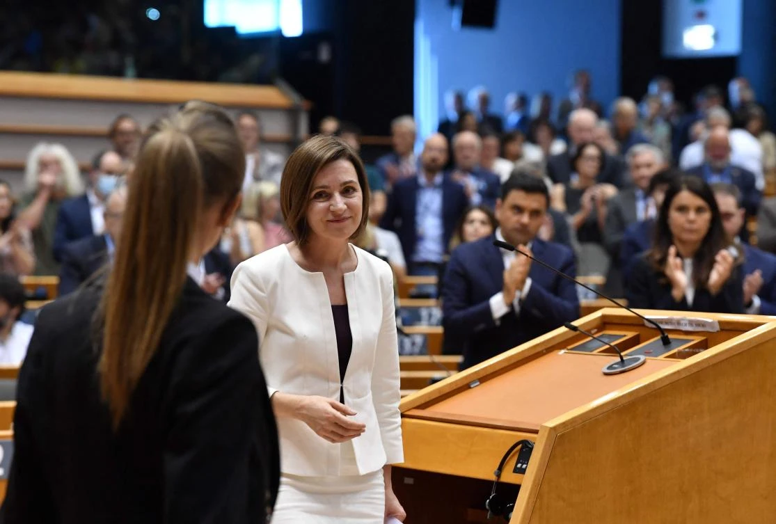 Moldova's President Maia Sandu leaves after her speech on the war in Ukraine and its impact on Moldova, during a plenary session at the European parliament in Brussels on May 18, 2022. (AFP)