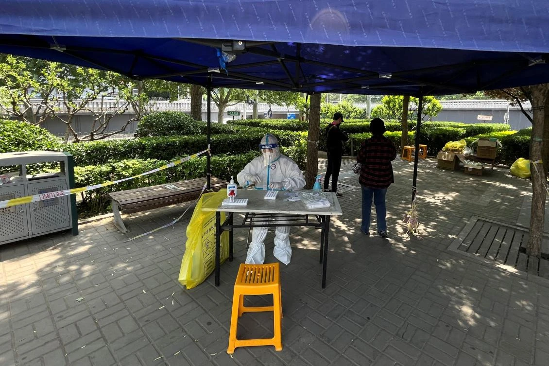 Five of the Beijing’s 16 districts advised residents to work from home and avoid gatherings. Those who have to go to work should have a negative result on a PCR test taken within 48 hours. (Reuters)