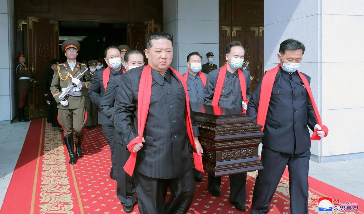 North Korean leader Kim Jong Un carries the casket during the state funeral for Marshal of the Korean People’s Army Hyon Chol Hae in Pyongyang on May 22, 2022. (KCNA via Reuters)