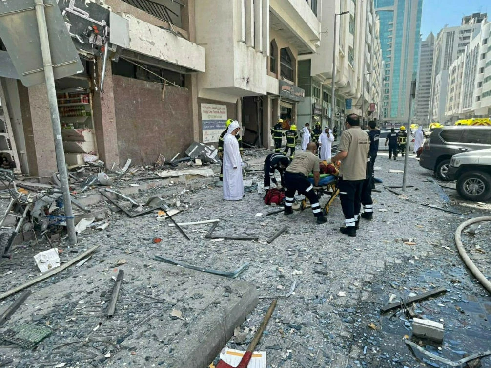 The blast on Monday set off a fire that damaged the facades of six buildings and a number of stores. (AP)
