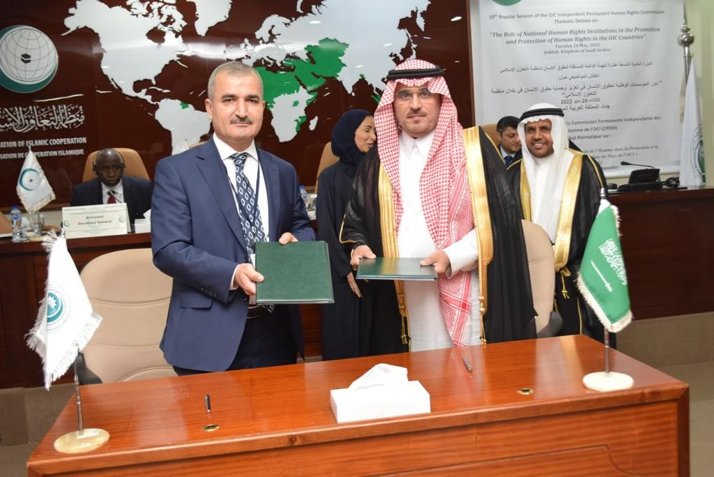 Abdulaziz Abdullah Al-Khayal, right, Vice president of the Saudi Human Rights Commission, and Dr. Haci Ali Acikgul OIC-IPHRC Chairperson after signing the memorandum. (Supplied)