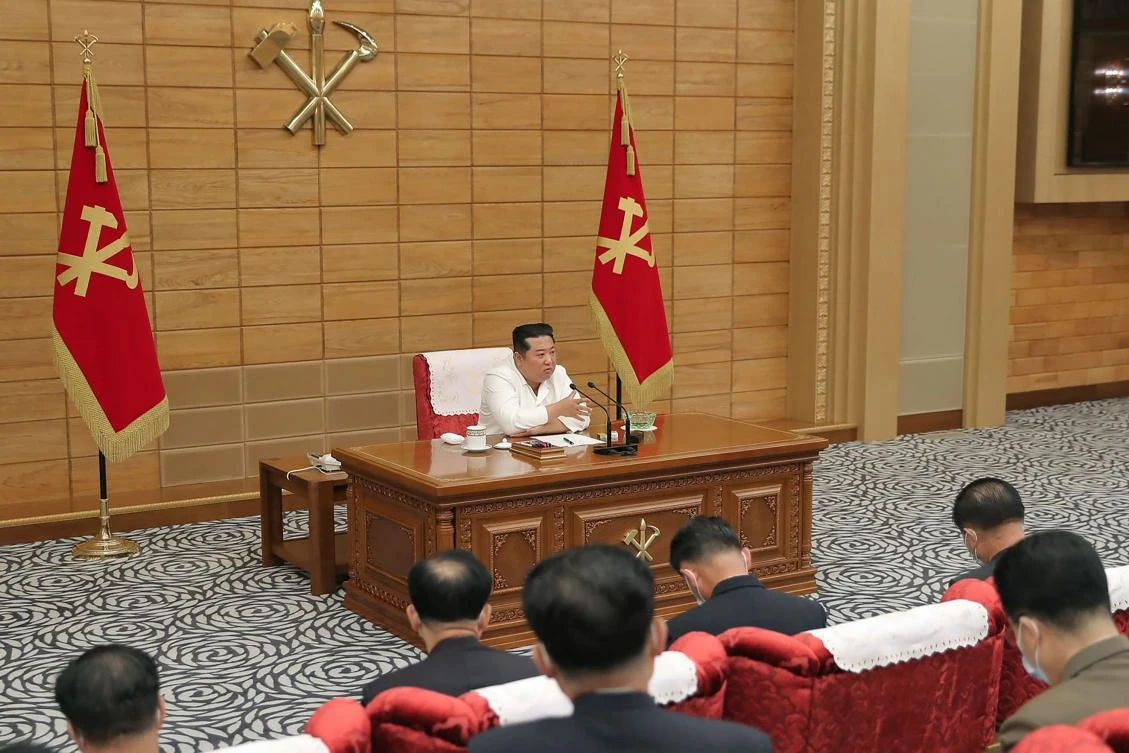 The discussion at North Korea’s Politburo meeting suggests it will soon relax a set of draconian curbs imposed after its admission of the omicron outbreak this month. (KCNA via KNS/AFP)