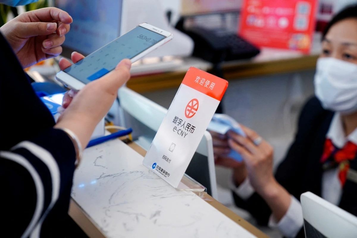 A sign indicating digital yuan, also referred to as e-CNY, is pictured at a shopping mall in Shanghai. (Reuters/File)