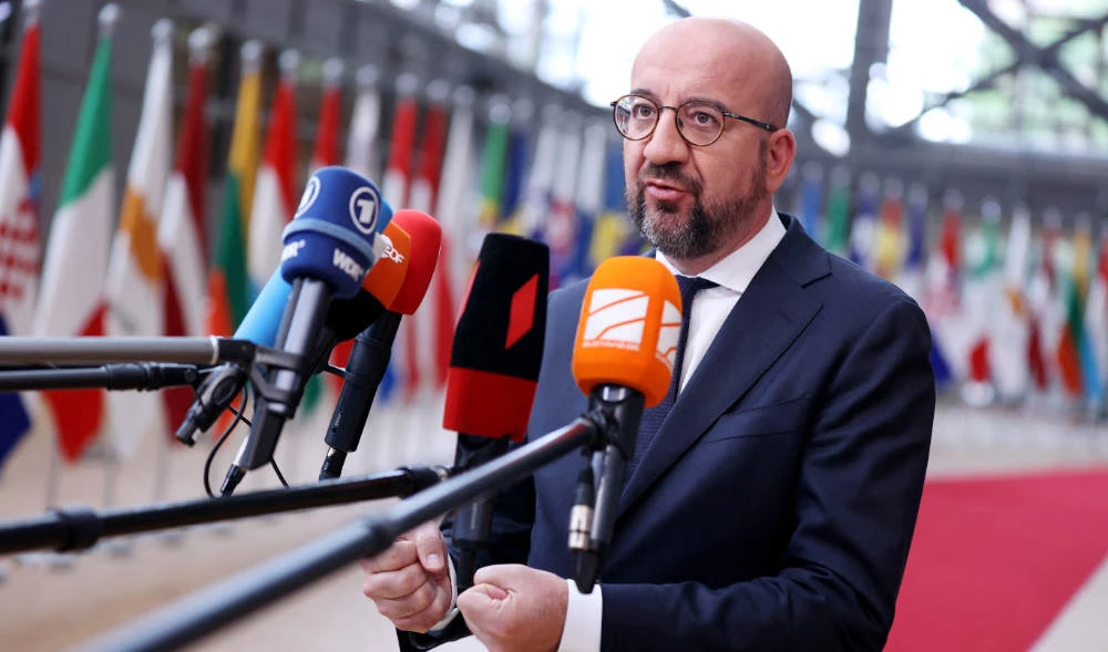 President of the European Council Charles Michel talks to press as he arrives for the first day of a special meeting of the European Council at The European Council Building in Brussels on May 30, 2022. (AFP)