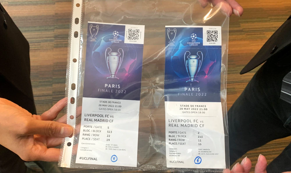 A real, left, and a fake ticket for the Champions League final are displayed at a press conference in Paris Monday, May 30, 2022 following a meeting on security after incidents during the Champions League final at the Stade France stadium. (AP)