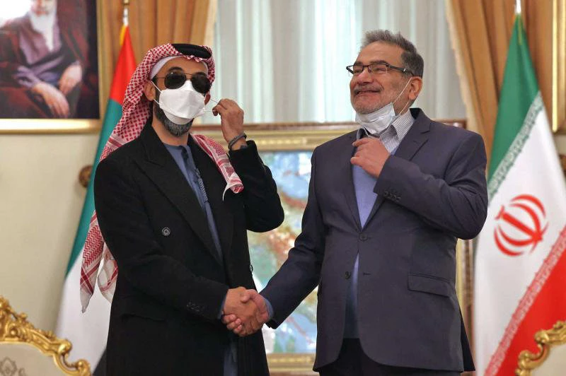 UAE's Sheikh Tahnoun bin Zayed Al-Nahyan (L) meets with Iranian official Ali Shamkhani on Dec. 6, 2021. (AFP)