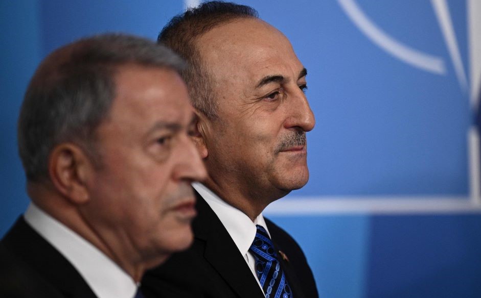 Turkey’s Defense Minister Hulusi Akar and Turkish FM Mevlut Cavusoglu, NATO summit, Madrid, June 29, 2022. (AFP)