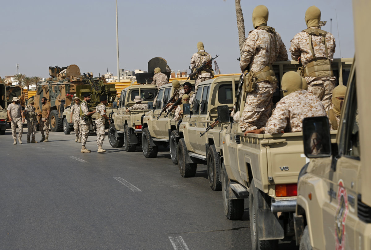 Forces loyal to Abdul Hamid Dbeibah, one of Libya's two premiers, secure the streets of Tripoli on May, 17, 2022. (AP)