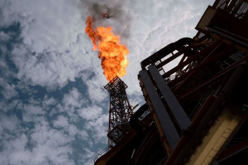 A Total offshore facility sends flames into the sky off the coast of Angola. (AFP)