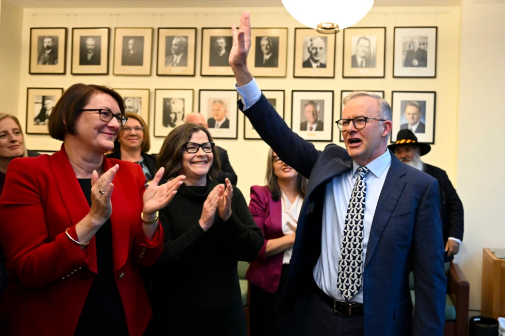 Australia's Prime Minister Anthony Albanese, second right, acknowledges fellow Labor Party colleagues during a party caucus at Parliament House in Canberra, Tuesday, May 31, 2022. (AP)