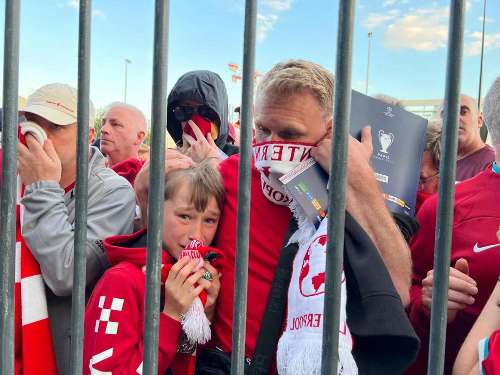 Liverpool fans react as they queue to access Stade de France before Champions League final against Real Madrid on Saturday. (Reuters)