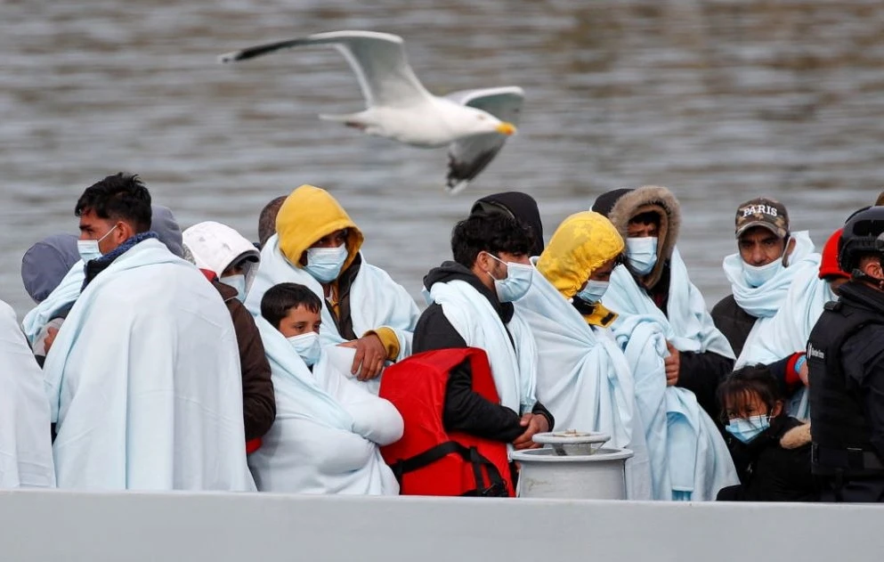 Migrants wait to disembark at the Port of Dover, after being rescued while crossing the English Channel, Dover, Britain, April 14, 2022. (Reuters)