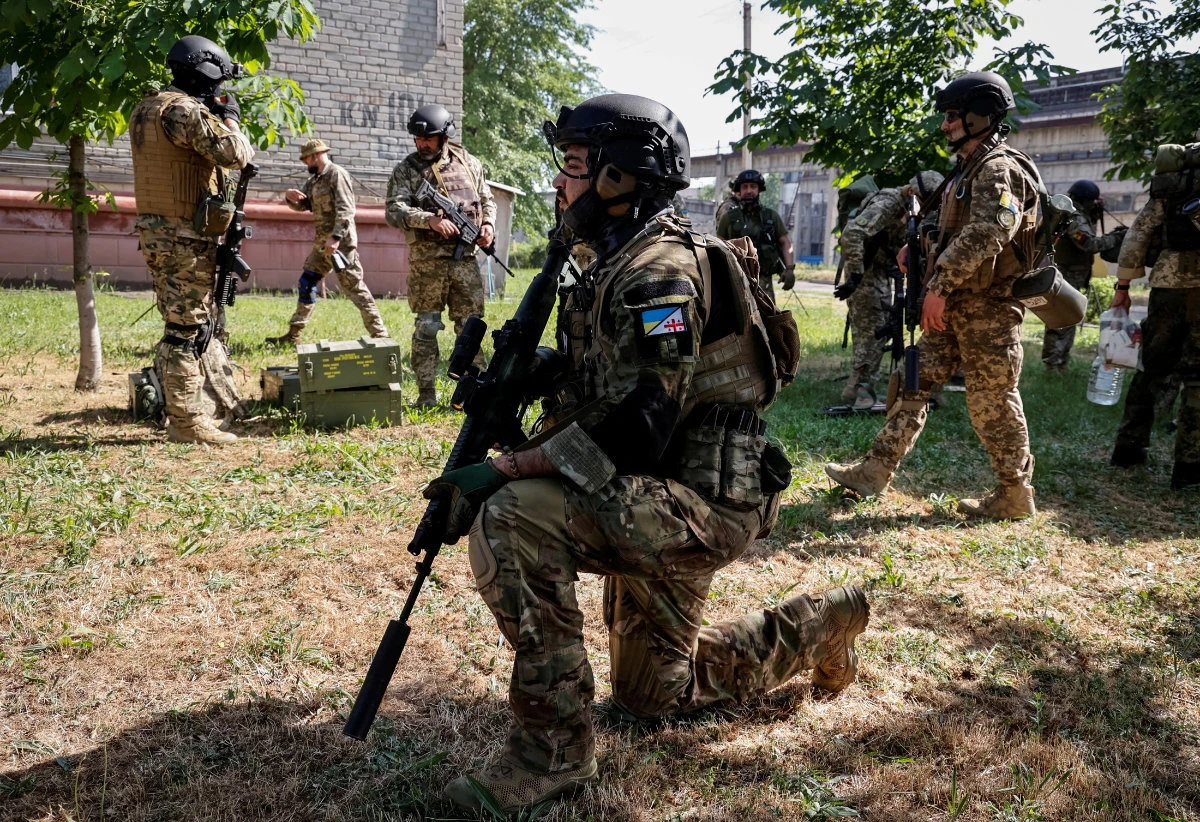 Foreign volunteers fighting with the Ukrainian army take positions as Russia's attack on Ukraine continues in Sievierodonetsk, Luhansk region, on June 2, 2022. (REUTERS)