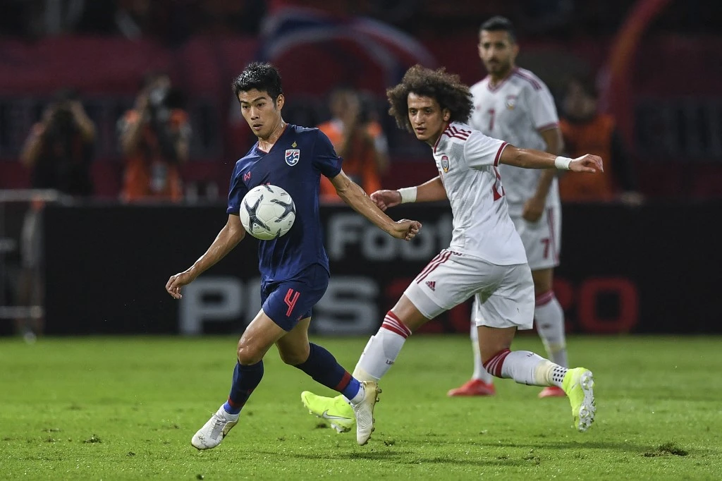 Omar Abdulrahman, right, blossomed into one of Asia’ finest playmakers by the time the quadrennial continental competition rolled around. (AFP)