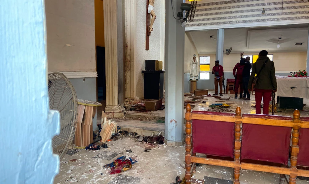 St Francis Catholic Church following an explosion in Owo Nigeria, Sunday, June 5, 2022. Lawmakers in southwestern Nigeria say more than 50 people are feared dead after gunmen opened fire and detonated explosives at a church. (AP)