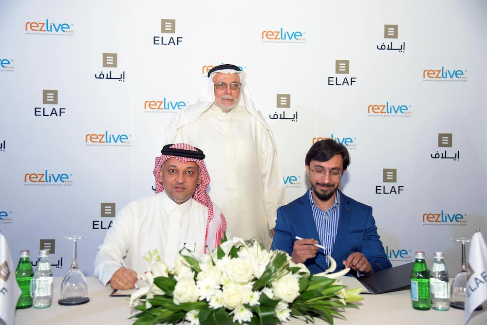 Elaf Group CEO Dr. Adel Ezzat and RezLive Country Manager Ahmed Jilani signed the memorandum of understanding in Jeddah on Sunday. (Supplied)