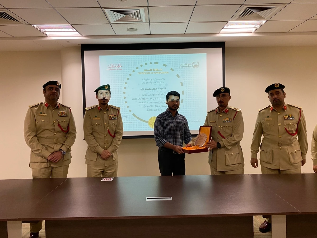 Dubai police honor expat for handing in million dirhams cash found in building elevator