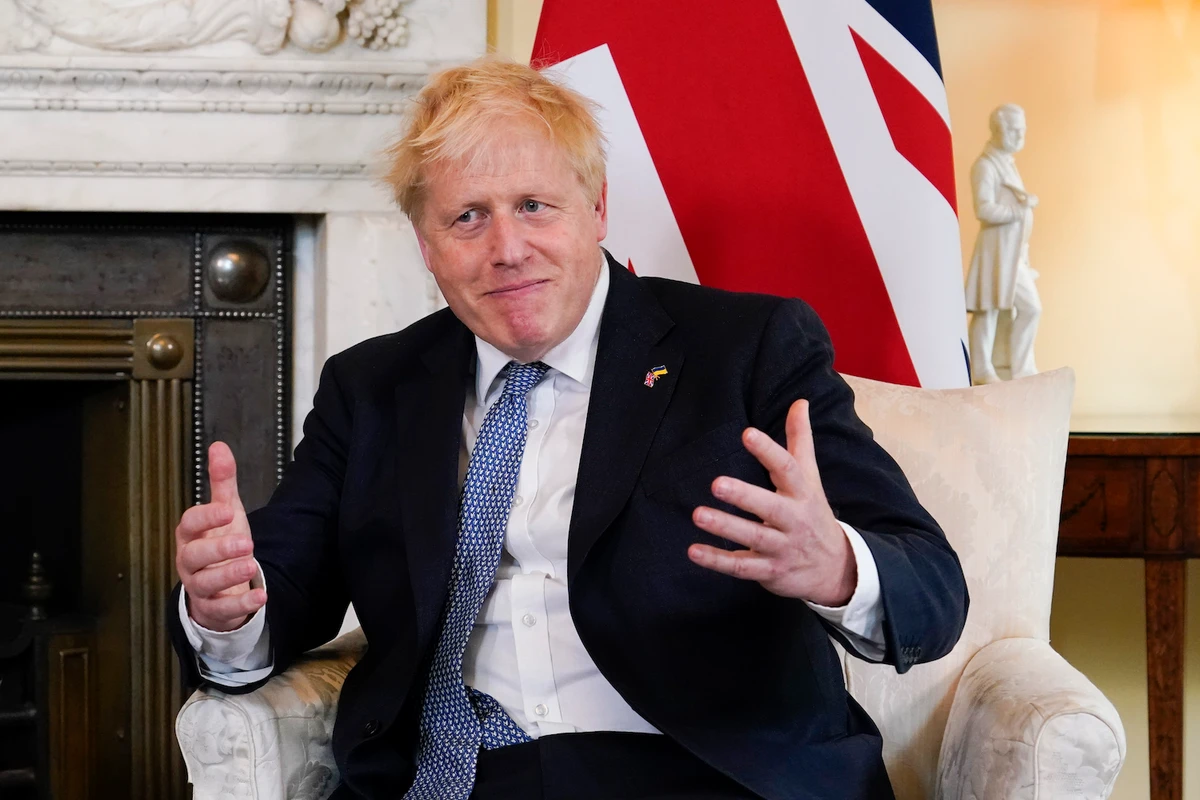 Britain's Prime Minister Boris Johnson gestures as he meets Estonia's Prime Minister Kaja Kallas at 10 Downing Street, London, Monday, June 6, 2022. (AP)