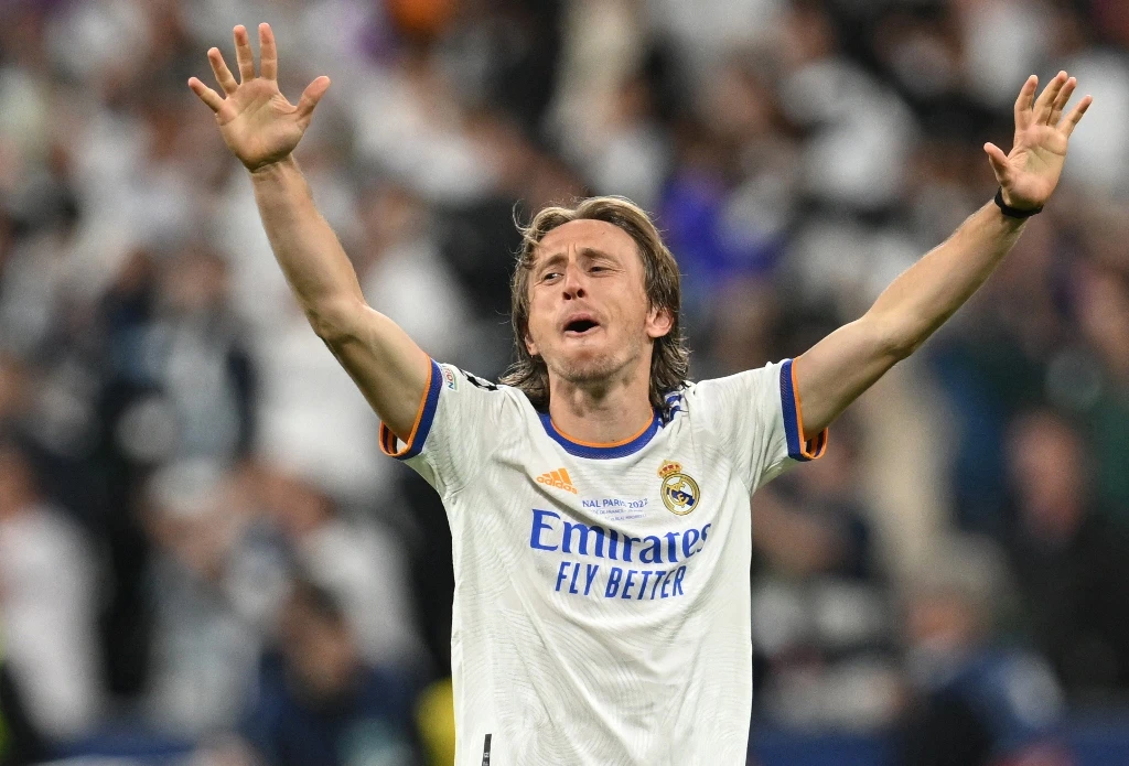 Real Madrid's Croatian midfielder Luka Modric has renewed for another season, the Madrid club announced on Wednesday. (AFP)