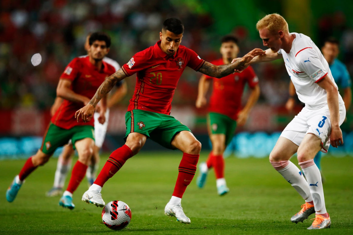Portugal's Joao Cancelo in action with Czech Republic's Vaclav Jemelka during their UEFA Nations League Group B football match on Thursday. (Reuters)