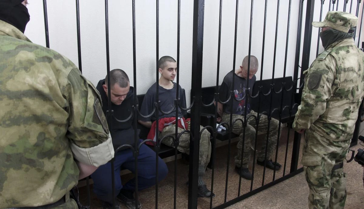 Two British citizens and a Moroccan have been sentenced to death by pro-Moscow court for fighting on Ukraine's side. (AP)