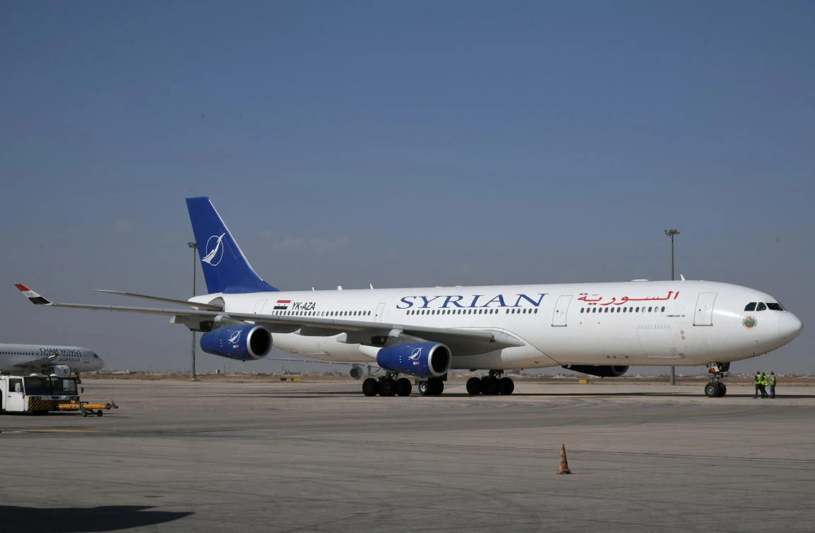 A SyrianAir Airbus A340-300 is pictured at Damascus International Airport, in this handout released by SANA on October 1, 2020, Syria. (SANA/Handout via Reuters)