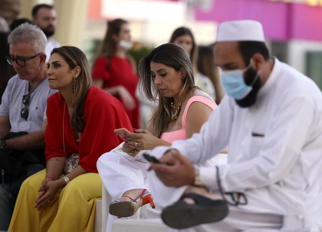 The UAE early this year dropped mandatory wearing of face masks in outside areas, the most significant easing of COVIDd-19 restrictions since April 2020. (AFP)