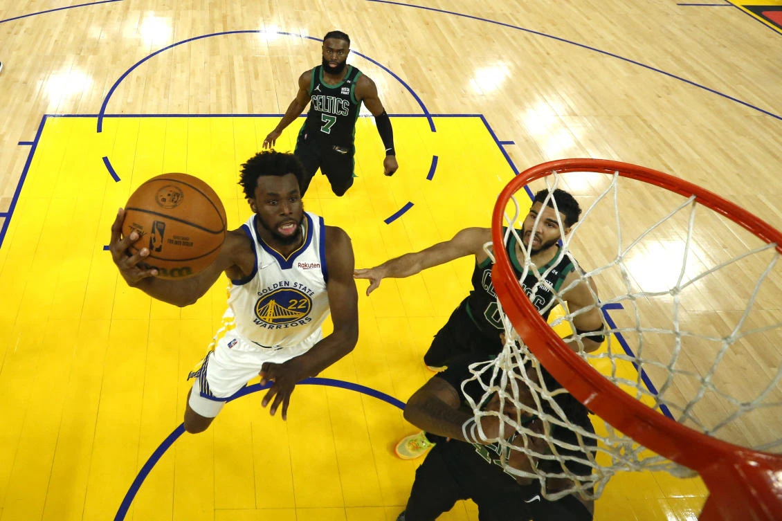 Andrew Wiggins delivered a huge performance for the Warriors at both ends of the court, shooting 12-of-23 while hauling in 13 rebounds with two steals and a block. (USA TODAY Sports)