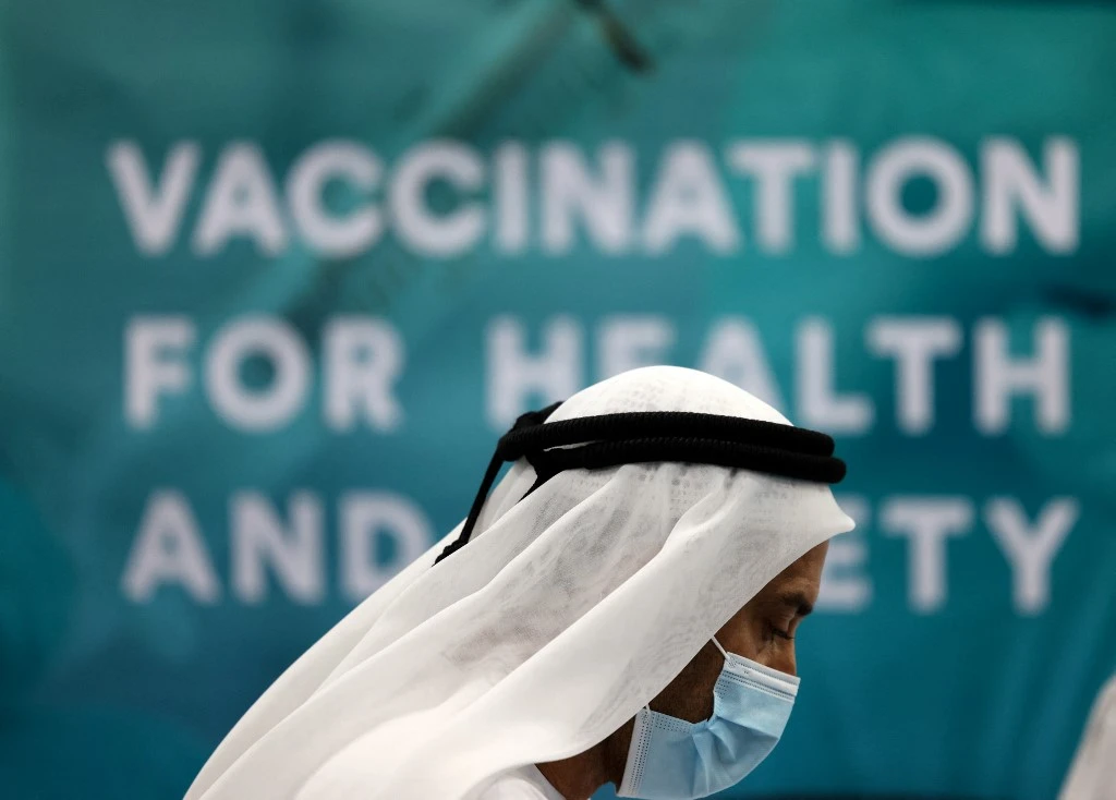 Wearing masks in closed areas is still mandatory, according to Dr. Taher Al-Ameri. (File/AFP)