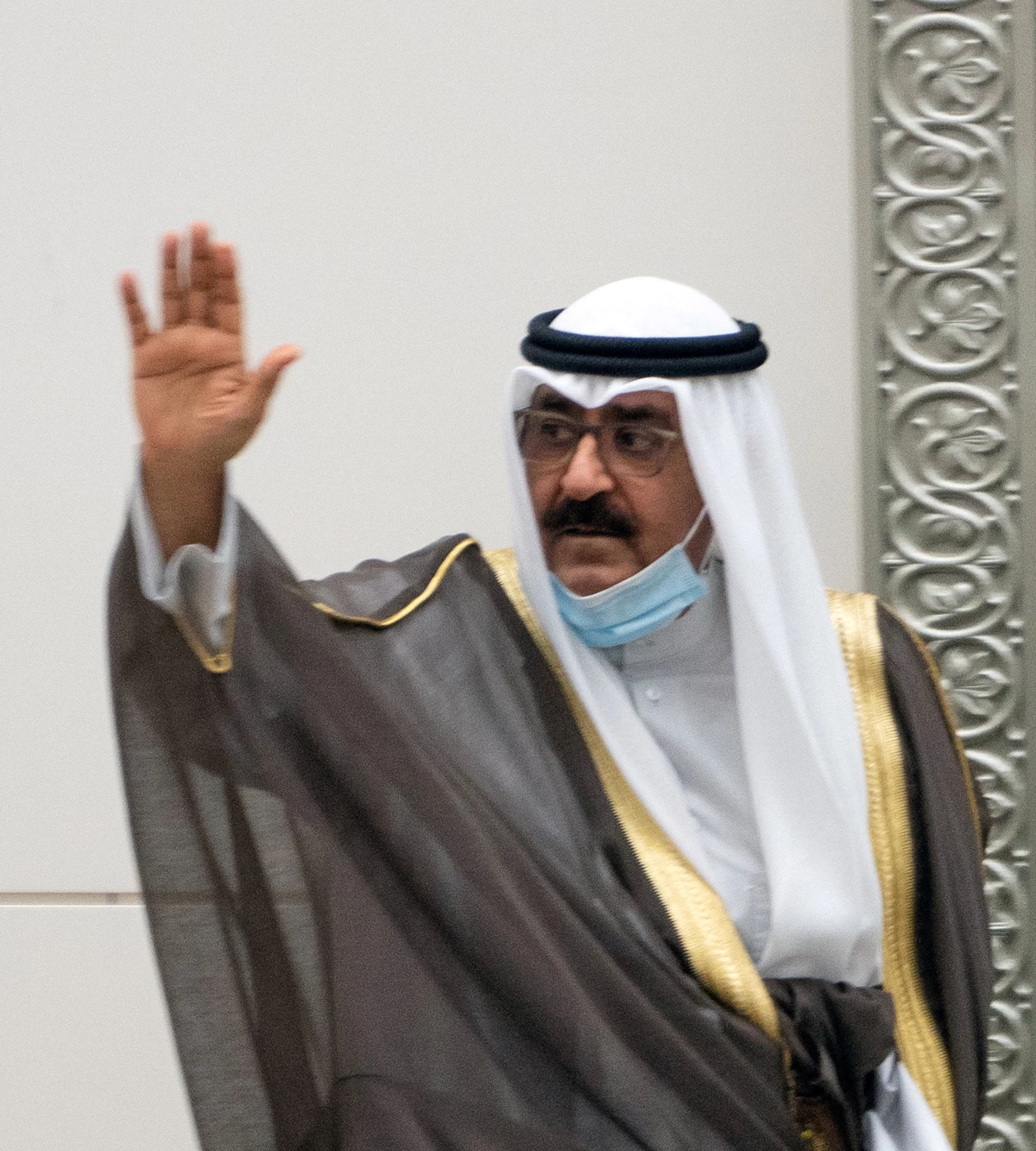 Kuwait's newly appointed crown prince Sheikh Meshal al-Ahmad Al-Jaber al-Sabah waves before he is sworn in, at the parliament, in Kuwait City, Kuwait October 8, 2020. (Reuters)