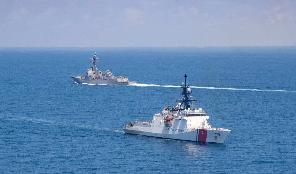 The Arleigh Burke-class guided-missile destroyer USS Kidd and US Coast Guard cutter Munro conduct Taiwan Strait transits. (REUTERS)