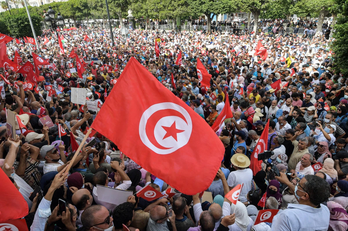Protesters in Tunis rail against President Kais Saied’s tightening grip on power. (AFP)