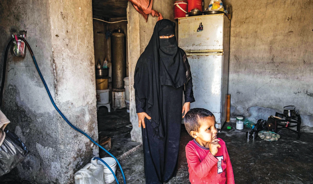 Noura Al-Khalif, a former detainee at the Kurdish-run Al-Hol camp, at her home in Raqqa, Syria. (Reuters)