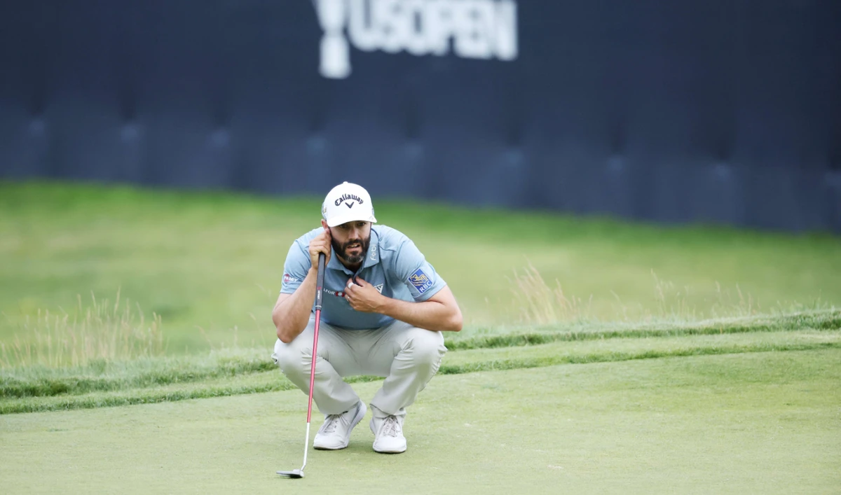 Adam Hadwin of Canada lines up a putt on the 18th green during round one of the 122nd US Open Championship at The Country Club on June 16, 2022 in Brookline, Massachusetts. (AFP)