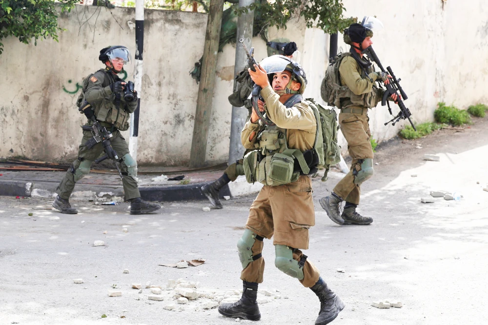 Heavy exchanges of gunfire were heard in videos circulated on social media. (AFP/File)