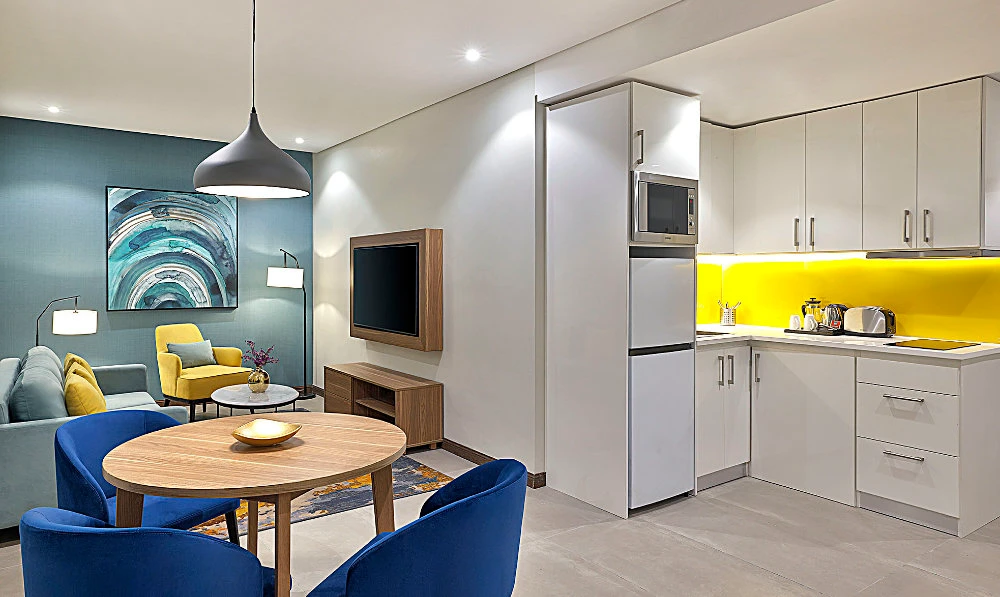 The hotel offers 68 spacious suites, all of which are equipped with fully fitted kitchenettes, a comfortable living space, and other modern amenities.