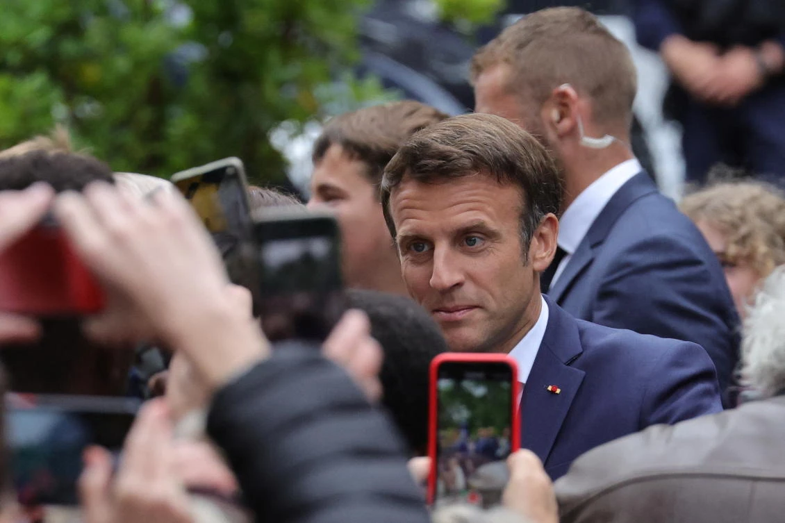 French President Emmanuel Macron arrives to vote in the second round of the French parliamentary elections, at a polling station in Le Touquet-Paris-Plage. (Reuters)